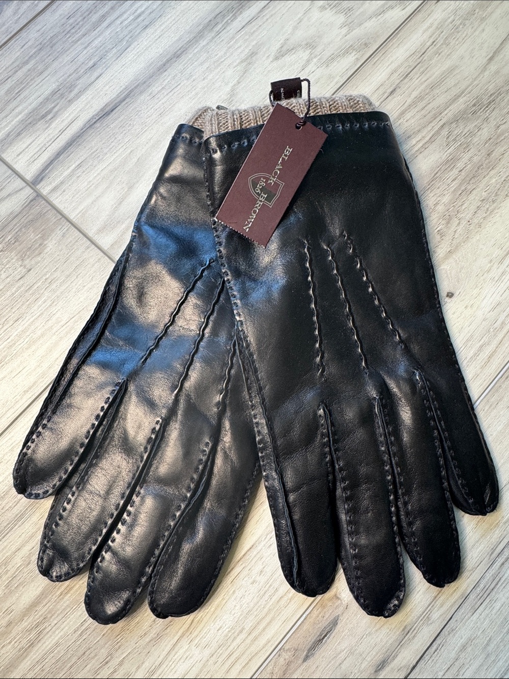 Black leather gloves